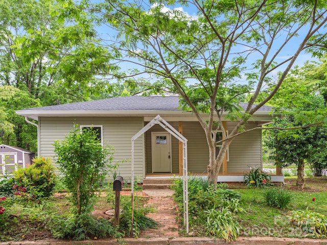123 Edwards Ave, Swannanoa, NC 28778 - view of front of home with a shingled roof and a porch