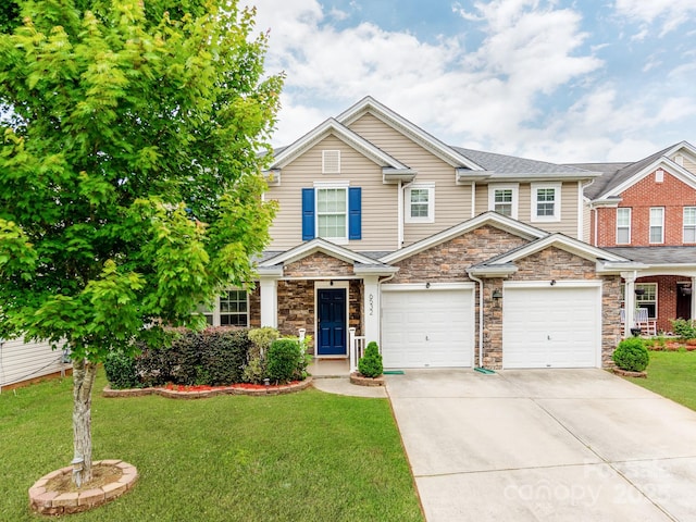 6532 Prosperity Commons Dr, Charlotte, NC 28269 - view of front facade with driveway, stone siding, a front yard, and an attached garage