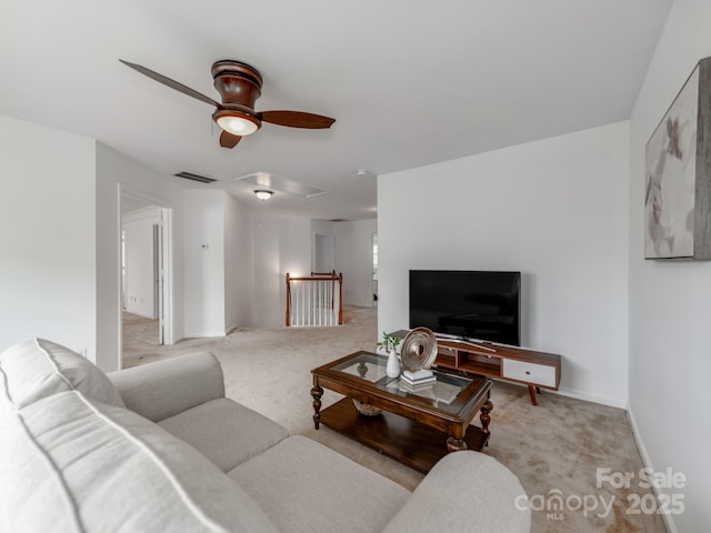 6532 Prosperity Commons Dr, Charlotte, NC 28269 - living room featuring attic access, light carpet, a ceiling fan, and baseboards