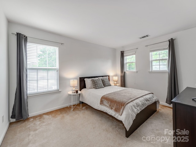 6532 Prosperity Commons Dr, Charlotte, NC 28269 - bedroom with baseboards and light colored carpet