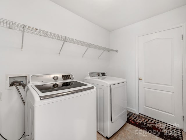 6532 Prosperity Commons Dr, Charlotte, NC 28269 - laundry room featuring independent washer and dryer and light tile patterned flooring