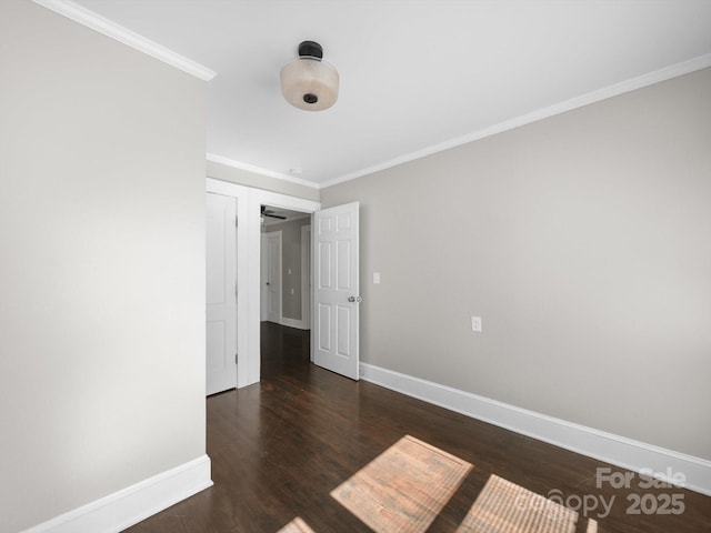 322 Peachtree St, Albemarle, NC 28001 - spare room featuring crown molding and wood finished floors