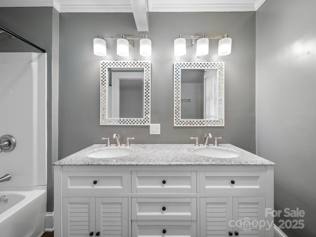 322 Peachtree St, Albemarle, NC 28001 - bathroom featuring crown molding, double vanity, and shower / bathtub combination