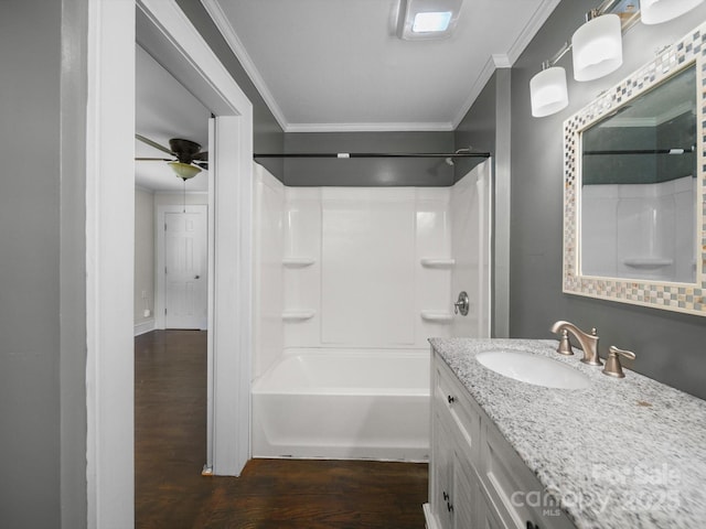 322 Peachtree St, Albemarle, NC 28001 - bathroom featuring ornamental molding, wood finished floors, ceiling fan, vanity, and  shower combination