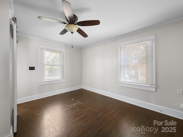 322 Peachtree St, Albemarle, NC 28001 - empty room with ornamental molding, dark wood-style floors, and ceiling fan