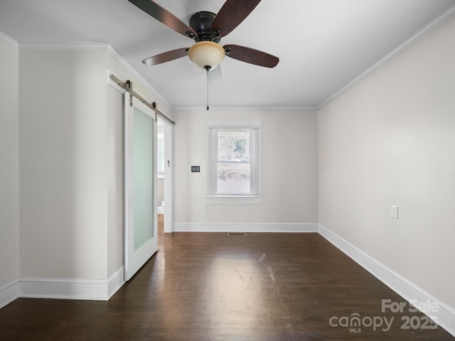 322 Peachtree St, Albemarle, NC 28001 - unfurnished room featuring a barn door, wood finished floors, ceiling fan, and crown molding