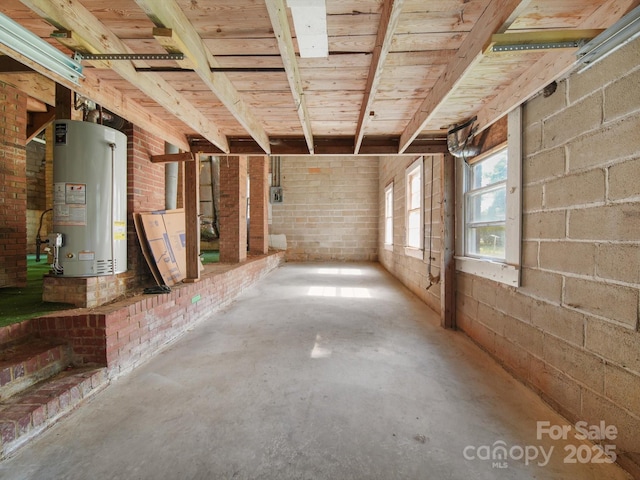 322 Peachtree St, Albemarle, NC 28001 - below grade area with gas water heater and brick wall