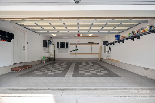 16909 Red Cow Rd, Charlotte, NC 28277 - garage featuring water heater and a garage door opener