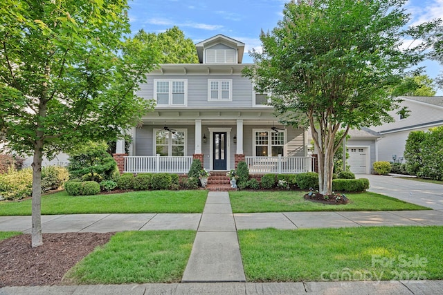 16909 Red Cow Rd, Charlotte, NC 28277 - view of front facade featuring a porch, a front yard, driveway, a garage, and ceiling fan
