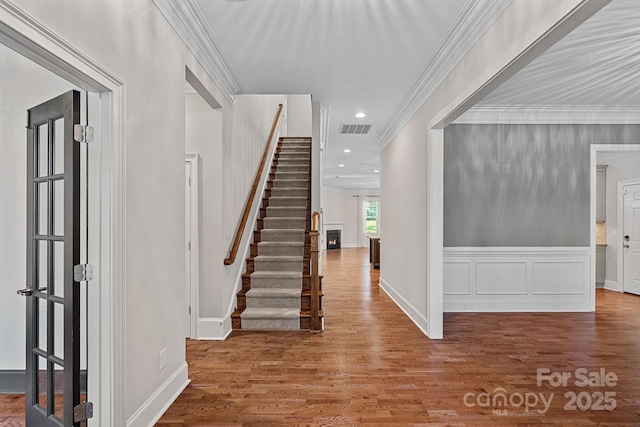 16909 Red Cow Rd, Charlotte, NC 28277 - foyer with stairs, wood finished floors, crown molding, and recessed lighting