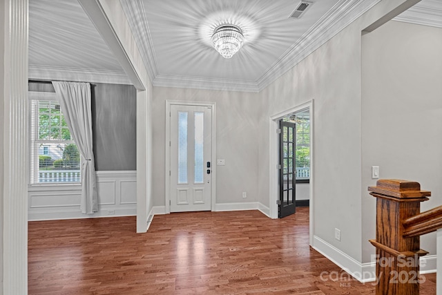 16909 Red Cow Rd, Charlotte, NC 28277 - entryway with ornamental molding and wood finished floors