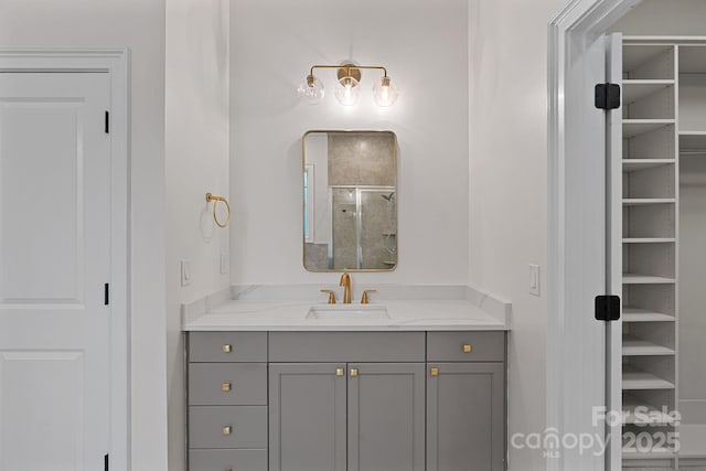 16909 Red Cow Rd, Charlotte, NC 28277 - full bathroom featuring a stall shower, vanity, and a walk in closet