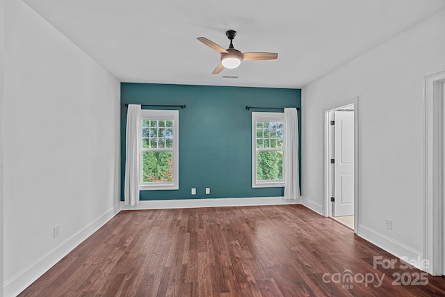 16909 Red Cow Rd, Charlotte, NC 28277 - unfurnished room featuring plenty of natural light, wood finished floors, and ceiling fan
