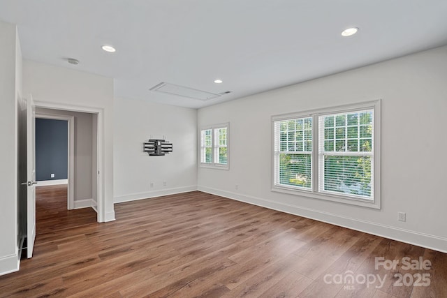 16909 Red Cow Rd, Charlotte, NC 28277 - empty room featuring wood finished floors, recessed lighting, attic access, and a smoke detector