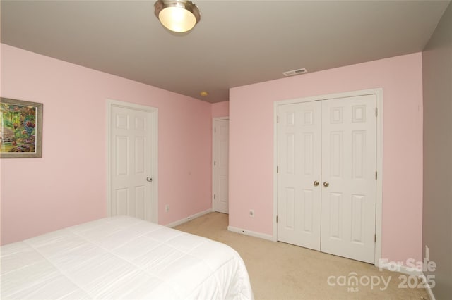 4001 Brook Valley Run, Monroe, NC 28110 - bedroom featuring light colored carpet, a closet, and baseboards