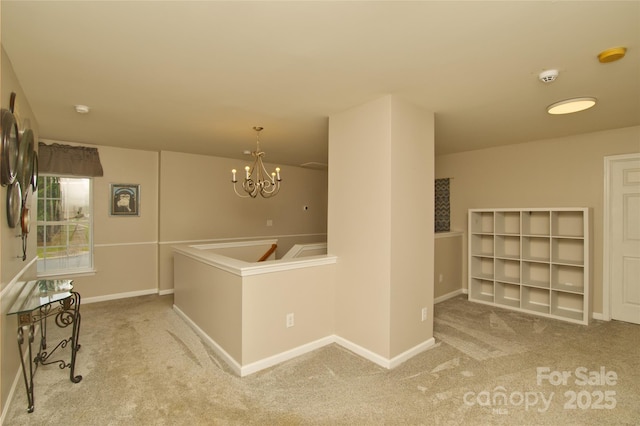 4001 Brook Valley Run, Monroe, NC 28110 - corridor featuring carpet floors, a chandelier, and baseboards