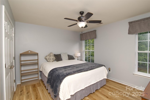 4001 Brook Valley Run, Monroe, NC 28110 - bedroom with wood finished floors, baseboards, and ceiling fan