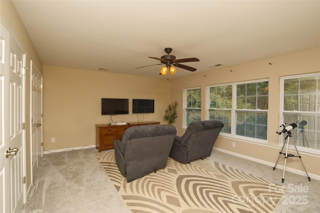 4001 Brook Valley Run, Monroe, NC 28110 - carpeted living area featuring baseboards, ceiling fan, and plenty of natural light