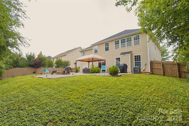 4001 Brook Valley Run, Monroe, NC 28110 - back of property featuring a gazebo, a patio, a gate, and central air condition unit