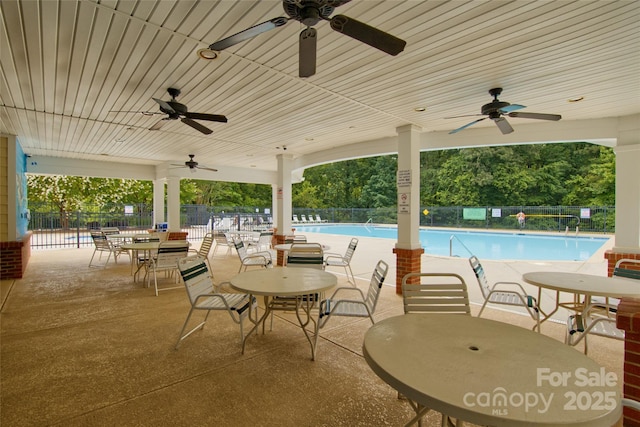4001 Brook Valley Run, Monroe, NC 28110 - view of patio with ceiling fan and a community pool
