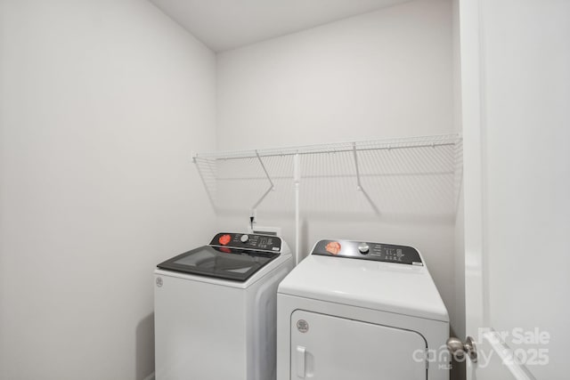 2119 Rolling Hills Ct, Stanley, NC 28164 - laundry area with washing machine and clothes dryer