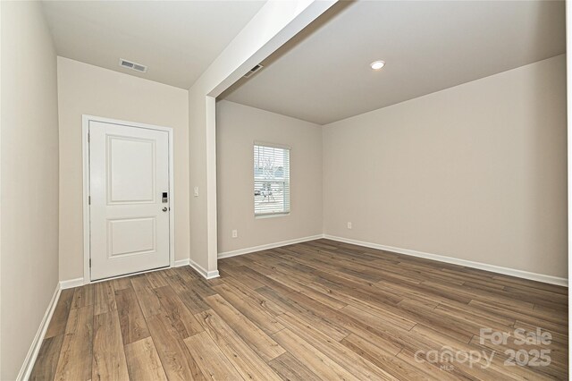 2123 Rolling Hills Ct, Stanley, NC 28164 - spare room featuring wood finished floors and recessed lighting
