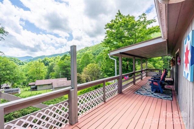 131 Apple Blossom Ln, Maggie Valley, NC 28751 - wooden terrace with a view of trees