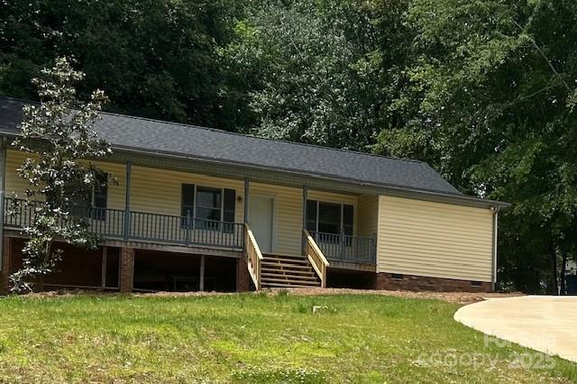 103 Sycamore Rd, Salisbury, NC 28147 - view of front facade with crawl space, covered porch, a front yard, and stairs