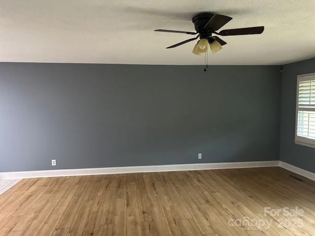 103 Sycamore Rd, Salisbury, NC 28147 - empty room with wood finished floors, baseboards, and ceiling fan