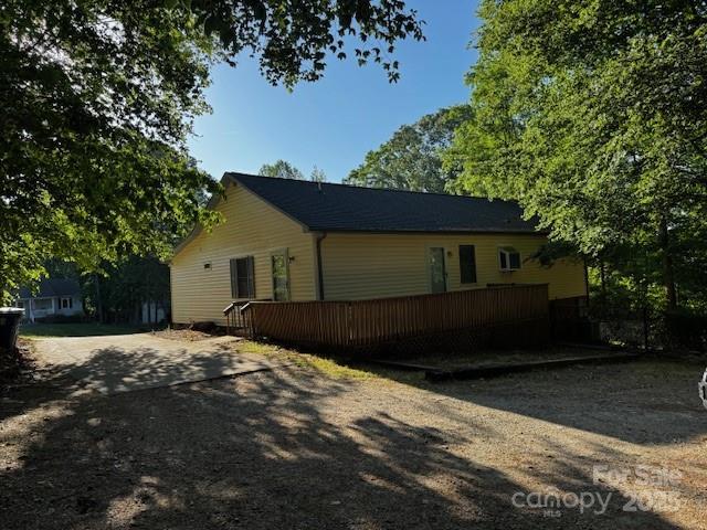 103 Sycamore Rd, Salisbury, NC 28147 - view of home's exterior with asphalt driveway and a wooden deck