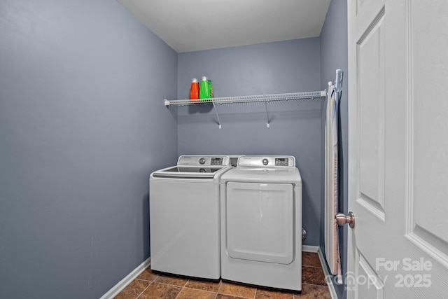 2233 Sonoma Valley Dr, Charlotte, NC 28214 - laundry area with independent washer and dryer and dark stone finish floors
