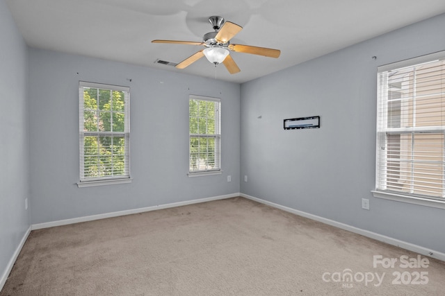 2233 Sonoma Valley Dr, Charlotte, NC 28214 - spare room featuring carpet and a ceiling fan