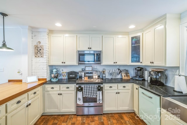 432 4th Street Pl SW, Hickory, NC 28602 - kitchen with appliances with stainless steel finishes, backsplash, pendant lighting, dark countertops, and recessed lighting