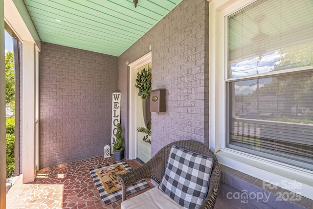 432 4th Street Pl SW, Hickory, NC 28602 - doorway to property with covered porch and brick siding