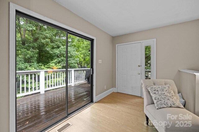 4043 Windward Dr, Tega Cay, SC 29708 - living area with light wood-style flooring and baseboards