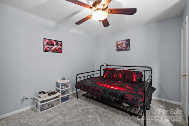 4043 Windward Dr, Tega Cay, SC 29708 - carpeted bedroom featuring baseboards and a ceiling fan
