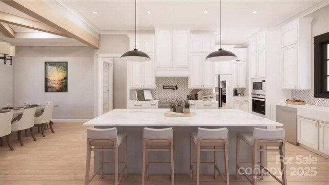 0000 Woodhill Cove Ln Unit 5, Denver, NC 28037 - kitchen with fridge, stainless steel dishwasher, backsplash, white cabinetry, and a kitchen island