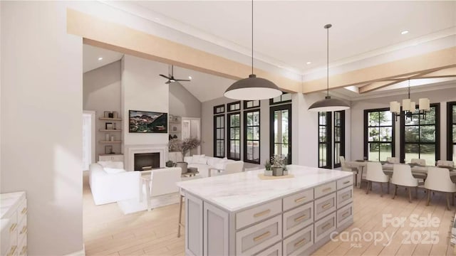 0000 Woodhill Cove Ln Unit 5, Denver, NC 28037 - kitchen with open floor plan, decorative light fixtures, light wood finished floors, a large fireplace, and a kitchen island