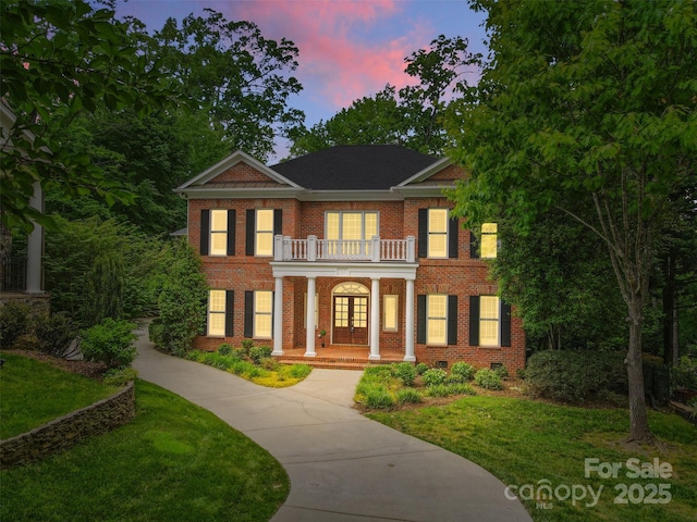1806 Asbury Hall Ct, Charlotte, NC 28209 - colonial house with a balcony, french doors, a porch, brick siding, and a lawn