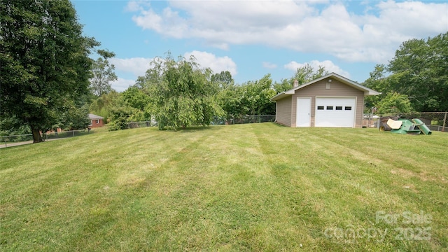 2411 Allendale Cir, Lenoir, NC 28645 - view of yard with a detached garage and an outbuilding