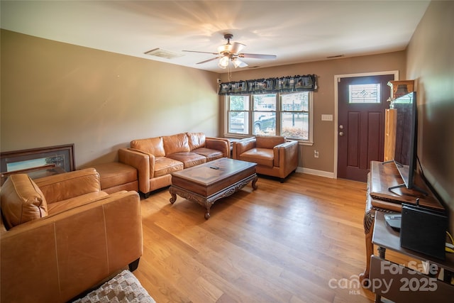 2411 Allendale Cir, Lenoir, NC 28645 - living area with ceiling fan, light wood finished floors, and baseboards