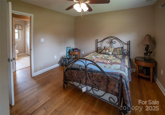 2411 Allendale Cir, Lenoir, NC 28645 - bedroom with wood finished floors, baseboards, and ceiling fan