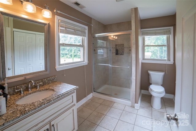 2411 Allendale Cir, Lenoir, NC 28645 - bathroom with baseboards, vanity, tile patterned flooring, a stall shower, and toilet
