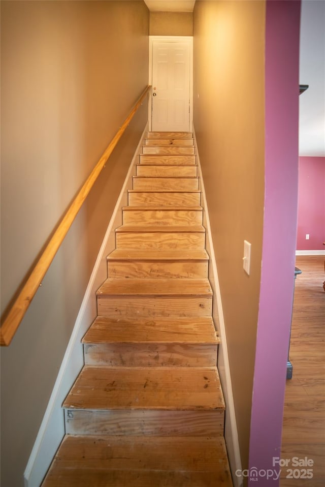 2411 Allendale Cir, Lenoir, NC 28645 - stairs with wood finished floors and baseboards