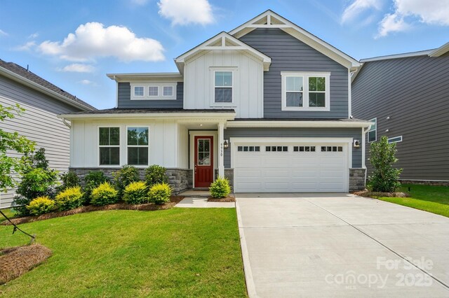 9930 Cask Way, Huntersville, NC 28078 - craftsman-style house with board and batten siding, driveway, a garage, and stone siding