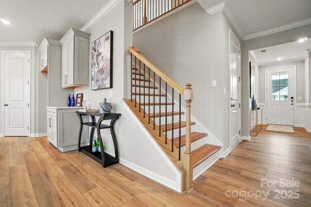 9930 Cask Way, Huntersville, NC 28078 - stairs featuring wood-type flooring, crown molding, and recessed lighting
