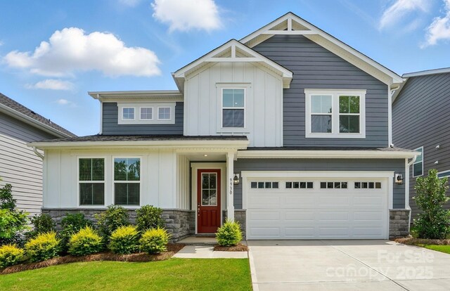 9930 Cask Way, Huntersville, NC 28078 - craftsman inspired home featuring board and batten siding, driveway, a garage, and stone siding