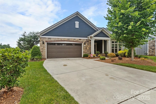 1712 Askern Ct, Waxhaw, NC 28173 - view of front facade with stone siding, concrete driveway, and a garage