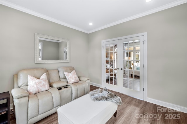 1712 Askern Ct, Waxhaw, NC 28173 - living area featuring french doors, wood finished floors, baseboards, crown molding, and recessed lighting