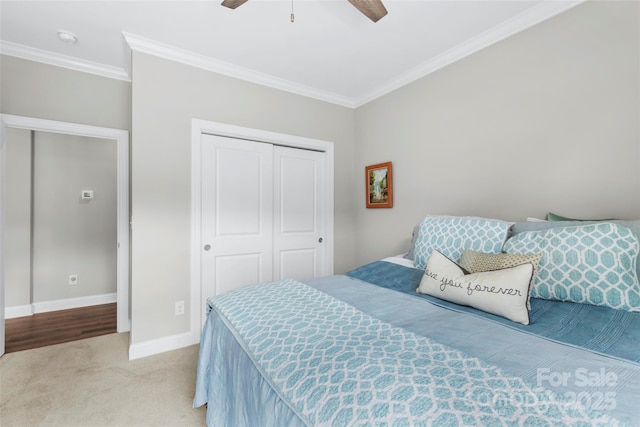 1712 Askern Ct, Waxhaw, NC 28173 - bedroom featuring crown molding, a closet, carpet, baseboards, and ceiling fan